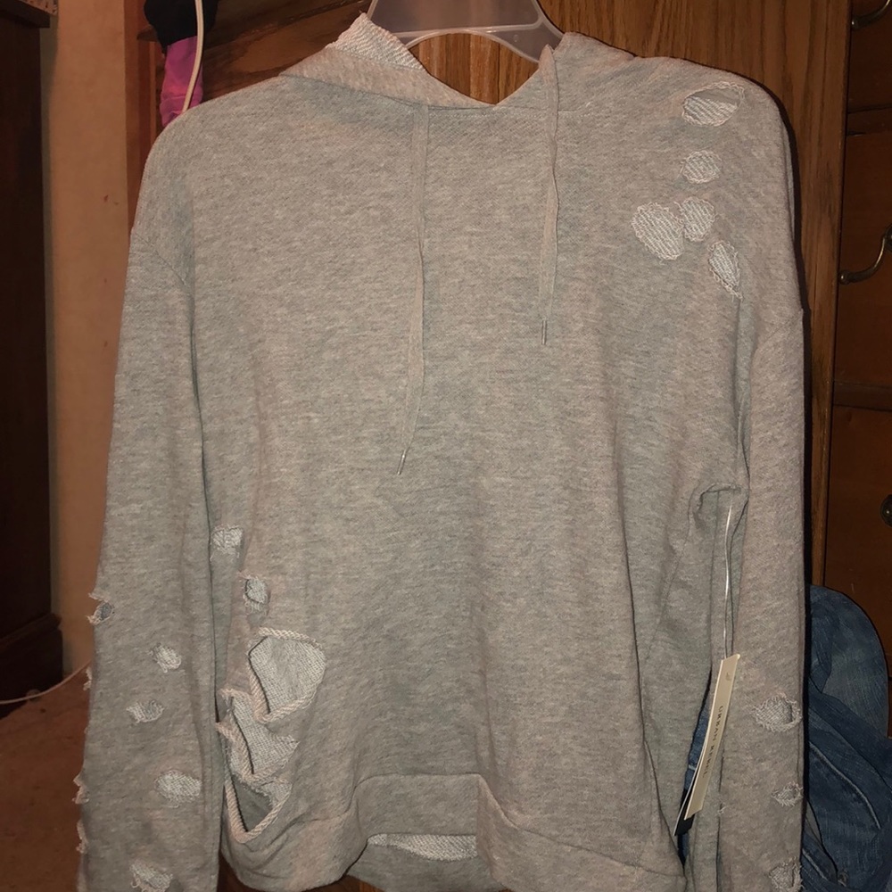 Sweater with holes in it. Beautiful